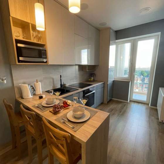 Стильный апартамент с панорамным видом в центре города