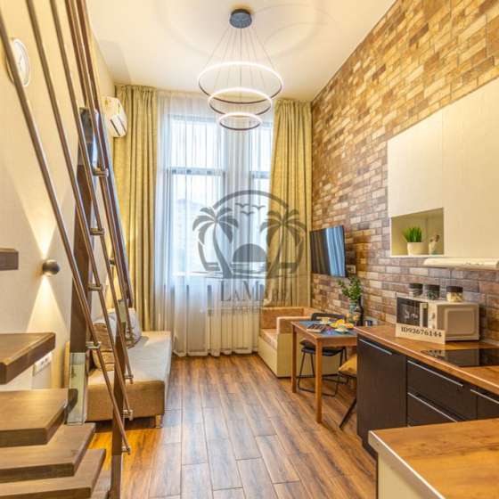 Двухуровневый апартамент в центре