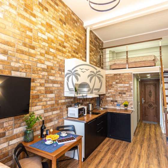 Двухуровневый апартамент в центре