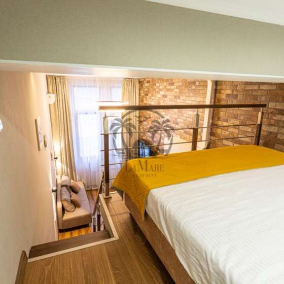 Двухуровневый апартамент в центре