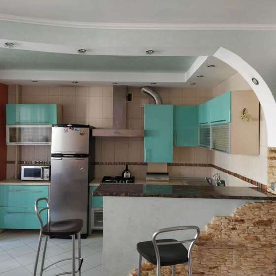 Двухкомнатная квартира с огороженной территорией